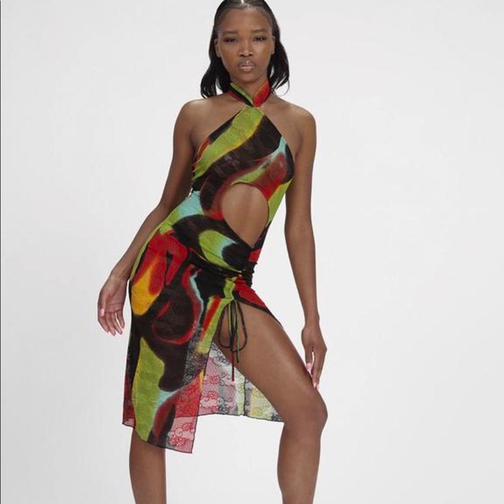 Kim shui green swirl cut out qi pao mini
